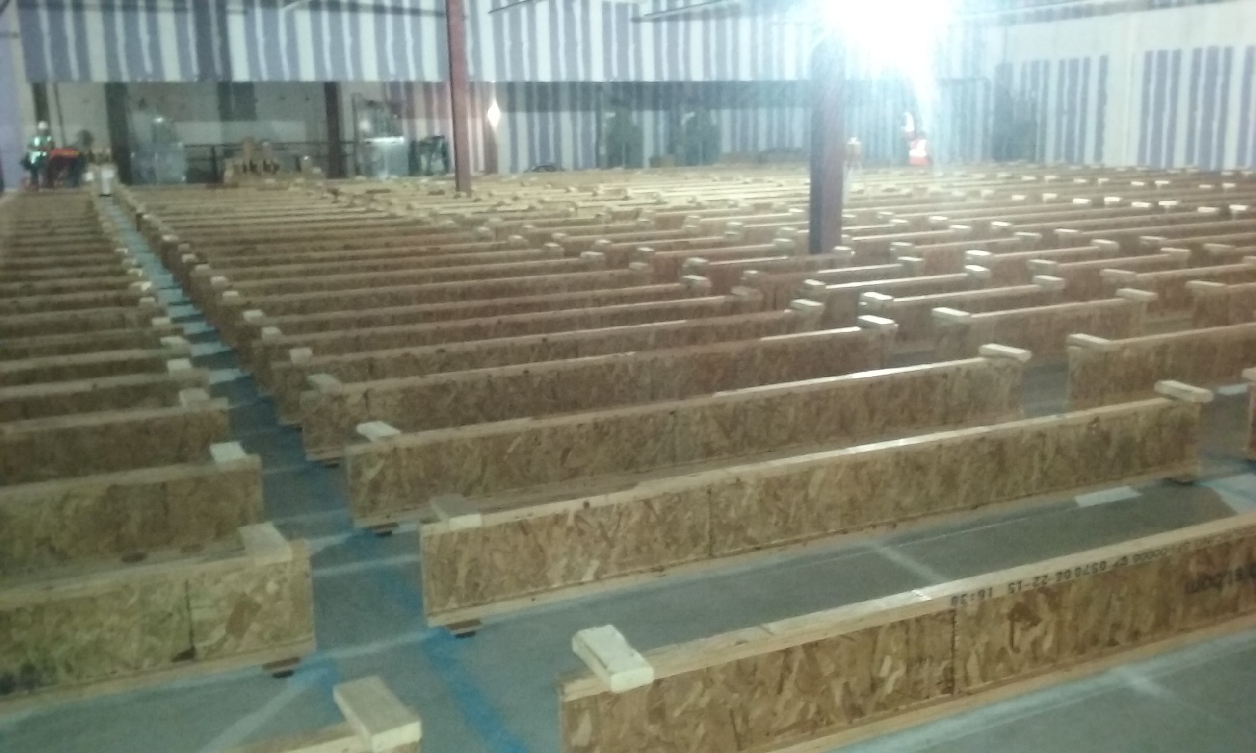 Wooden floor joists in warehouse construction — pre-install stage