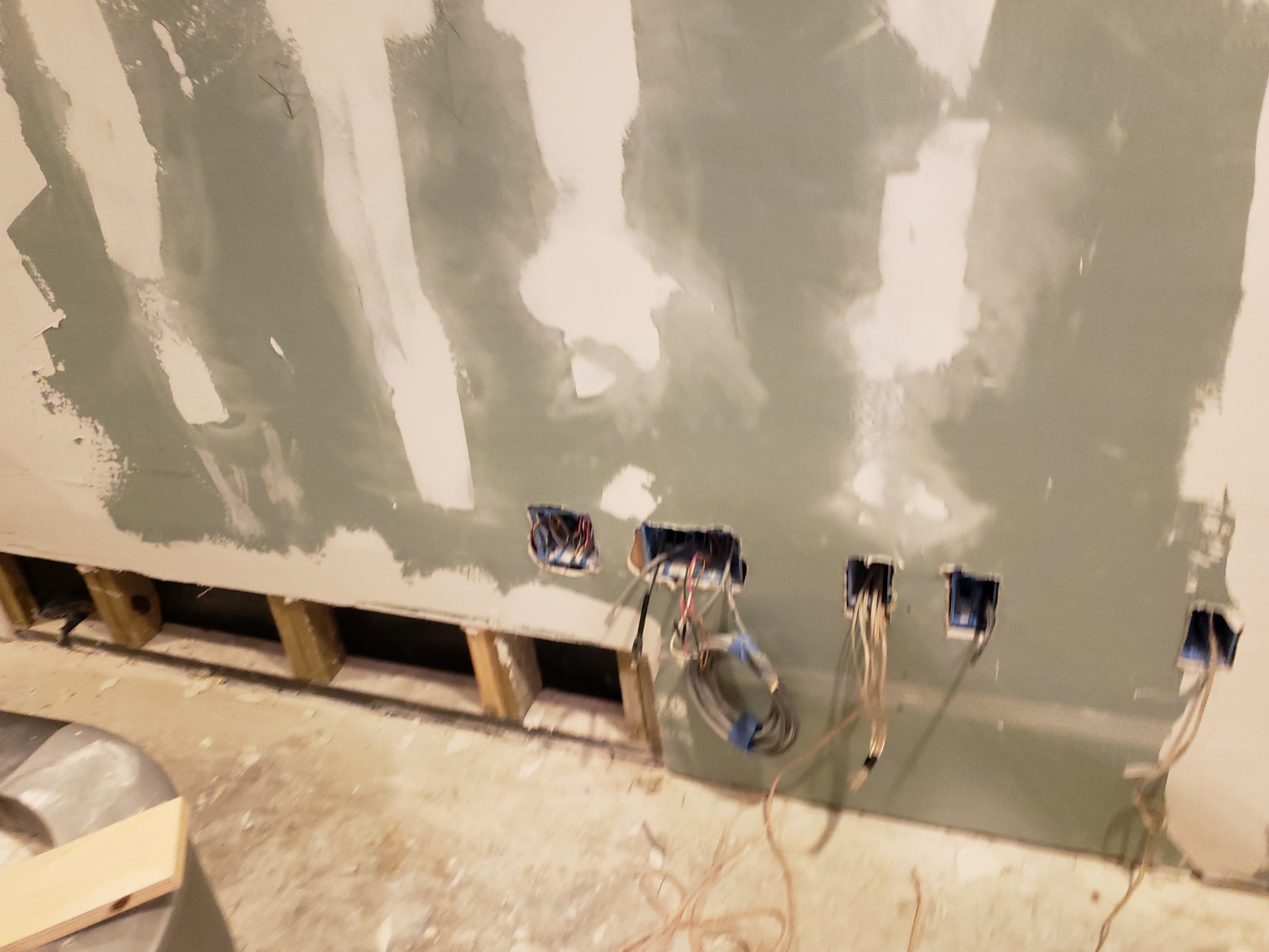Backyard theater electrical outlets and AV rough-in construction