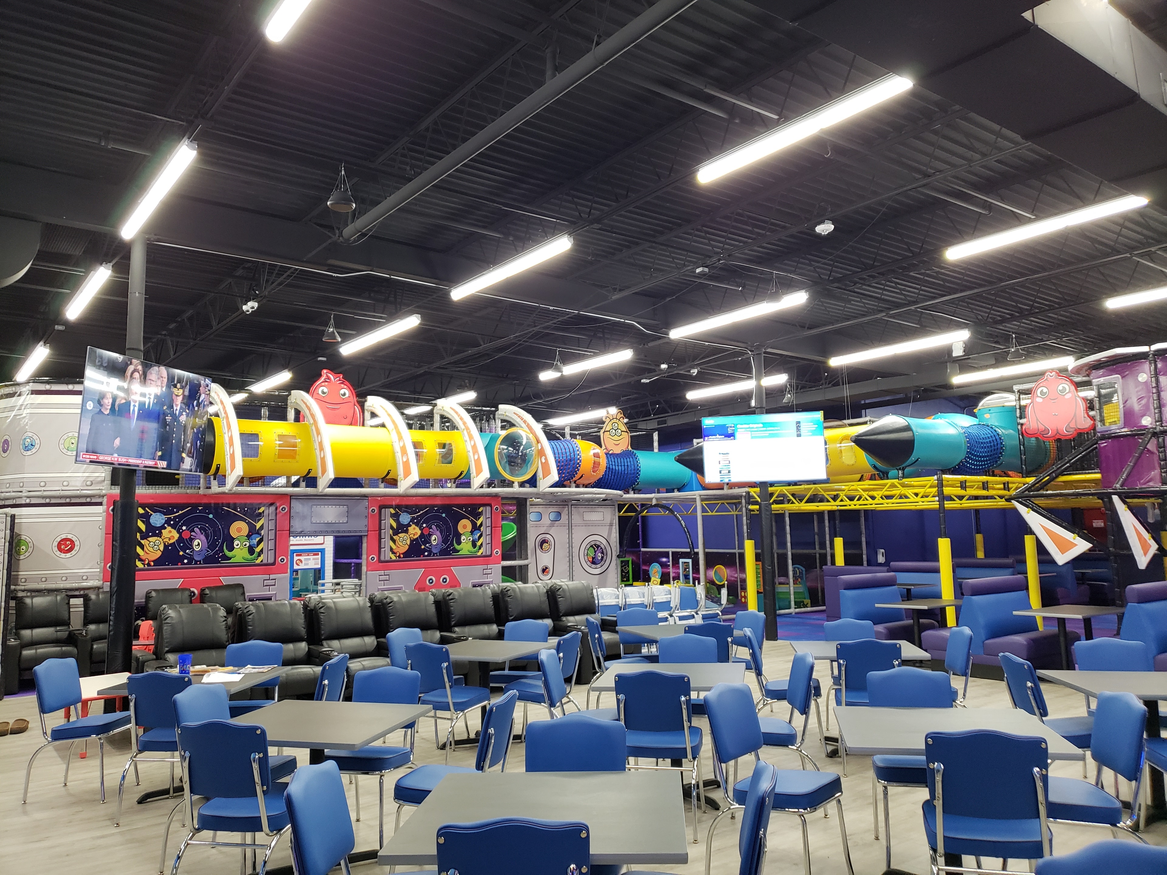 Indoor play center with colorful tube slides — pre-install
