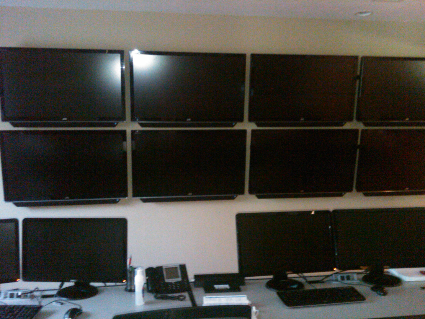 Control room with multi-screen wall