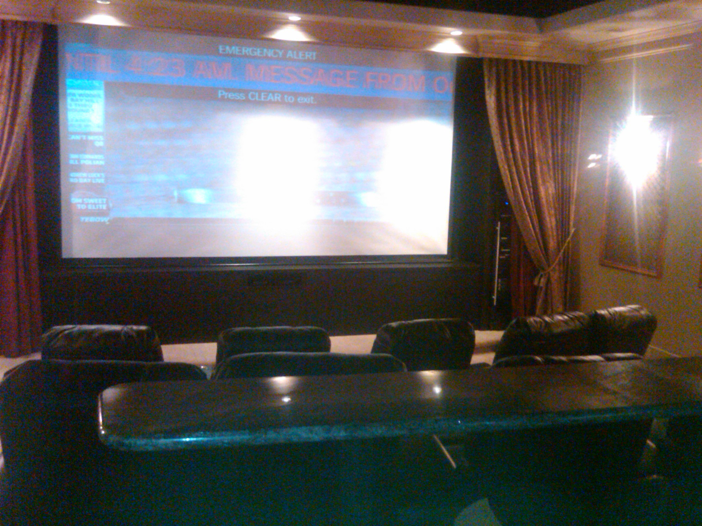 Home theater with projection screen